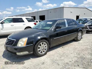 2010 Cadillac DTS 1SD z VIN 1G6KH5EY5AU110844, wystawiony jako Copart lot #57141785 z przebiegiem 173 657 mil mil oraz Tytuł czysty. Historia ofert i sprzedaży dostępna na DreamBid. Obrazek 1.