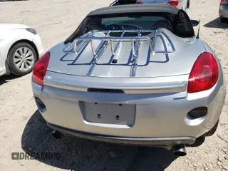 2007 Pontiac Solstice GXP z VIN 1G2MG35X07Y135497, wystawiony jako Copart lot #41842171 z przebiegiem 104 155 mil mil oraz Szkoda całkowita • Salvage title. Historia ofert i sprzedaży dostępna na DreamBid. Obrazek 6.