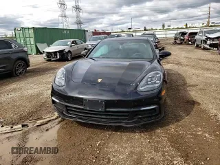 2018 Porsche Panamera 4 E-Hybrid z VIN WP0AE2A72JL127720, wystawiony jako Copart lot #71872404 z przebiegiem Nie podano mil oraz Szkoda całkowita • Salvage title. Historia ofert i sprzedaży dostępna na DreamBid. Obrazek 11.