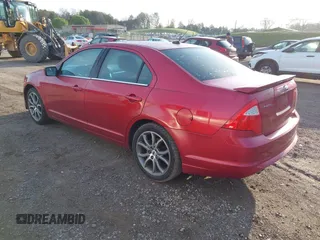 2011 Ford Fusion SE with VIN 3FAHP0HGXBR199597, listed as a IAAI auction lot 41950604 with 184,668 mi miles. Bid and sale history available at carsss.com. Image 3.