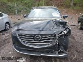 2021 Mazda CX-9 Carbon Edition with VIN JM3TCADY4M0517535, listed as a IAAI auction lot 41821261 with 60,053 mi miles. Bid and sale history available at carsss.com. Image 12.