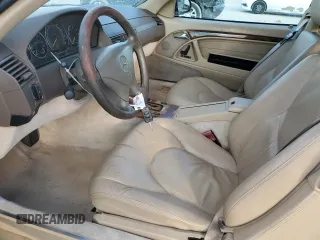 1999 Mercedes-Benz SL-Class with VIN WDBFA68F0XF186163, listed as a Copart auction lot 82669544 with 184,054 mi miles and Salvage Title. Bid and sale history available at carsss.com. Image 7.