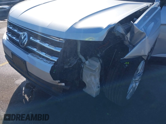 2019 Volkswagen Atlas SE with VIN 1V2UR2CA9KC527512, listed as a IAAI auction lot 41882212 with 102,765 mi miles and . Bid and sale history available at DreamBid. Image 6.