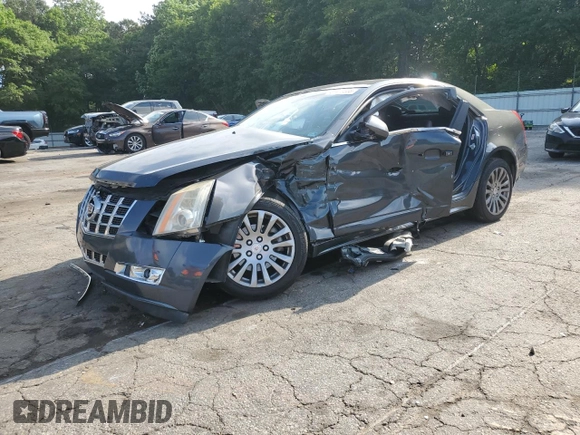 2013 Cadillac CTS Performance z VIN 1G6DK5E3XD0104466, wystawiony jako Copart lot #57479555 z przebiegiem Nie podano mil oraz Szkoda całkowita • Salvage title. Historia ofert i sprzedaży dostępna na DreamBid. Obrazek 1.
