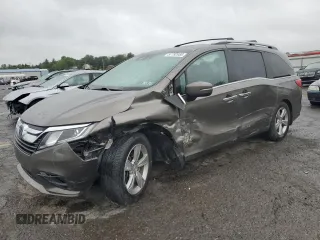 2018 Honda Odyssey EX-L с VIN 5FNRL6H7XJB035053, выставлен на аукционе Copart как лот 57792955 с пробегом 95 956 миль миль и Списание • Salvage title. История ставок и продаж доступна на DreamBid. Изображение 1.