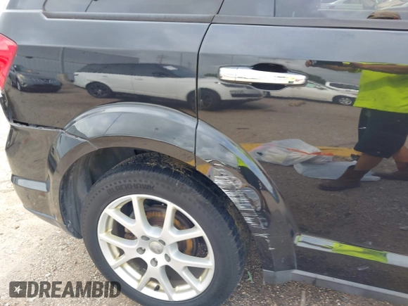 2012 Dodge Journey Crew с VIN 3C4PDCDGXCT200032, выставлен на аукционе IAAI как лот 42412809 с пробегом 154 423 миль миль и . История ставок и продаж доступна на DreamBid. Изображение 17.
