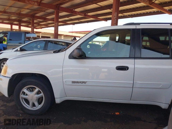 2004 GMC Envoy SLT with VIN 1GKDS13S442217242, listed as a IAAI auction lot 42573887 with 210,296 mi miles and . Bid and sale history available at DreamBid. Image 14.
