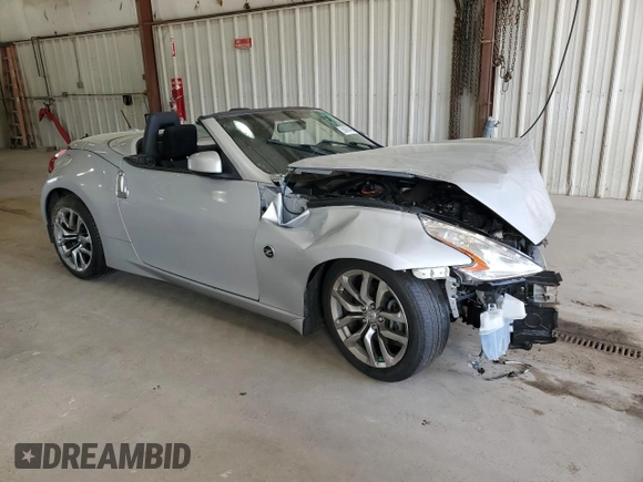 2014 Nissan 370Z Touring with VIN JN1AZ4FH0EM621207, listed as a Copart auction lot 50928485 with Not Provided miles and Salvage Title. Bid and sale history available at DreamBid. Image 4.