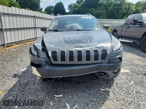 2014 Jeep Cherokee Trailhawk с VIN 1C4PJMBS1EW212024, выставлен на аукционе Copart как лот 58825265 с пробегом 99 087 миль миль и Списание • Salvage title. История ставок и продаж доступна на DreamBid. Изображение 5.