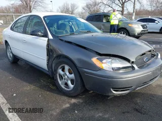 2003 Ford Taurus SE Standard with VIN 1FAFP53U13G210075, listed as a IAAI auction lot 41863786 with 64,943 mi miles. Bid and sale history available at carsss.com. Image 1.