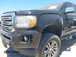 2017 GMC Canyon 2WD SLT z VIN 1GTG5DEN0H1215315, wystawiony jako IAAI lot #42247267 z przebiegiem 132 509 mil mil oraz . Historia ofert i sprzedaży dostępna na DreamBid. Obrazek 6.