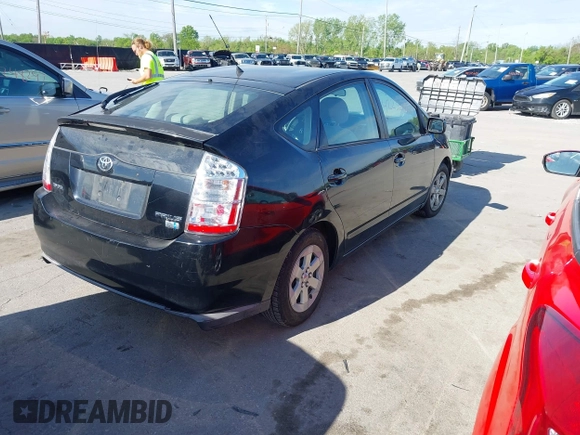 2008 Toyota Prius with VIN JTDKB20UX87704307, listed as a IAAI auction lot 42236776 with 142,996 mi miles and . Bid and sale history available at DreamBid. Image 4.