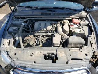 2015 Ford Taurus SEL with VIN 1FAHP2E89FG180089, listed as a Copart auction lot 58445555 with 151,240 mi miles and Salvage title. Bid and sale history available at DreamBid. Image 11.