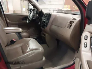 2001 Ford Escape XLT with VIN 1FMYU04101KF46809, listed as a IAAI auction lot 41664202 with 256,468 mi miles. Bid and sale history available at carsss.com. Image 5.