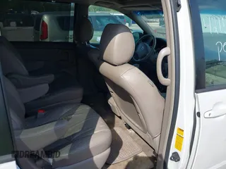 2009 Toyota Sienna XLE with VIN 5TDZK22C19S262107, listed as a IAAI auction lot 42158864 with 186,711 mi miles. Bid and sale history available at carsss.com. Image 8.