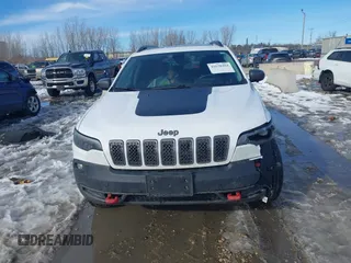 2019 Jeep Cherokee Trailhawk Elite with VIN 1C4PJMBX0KD315275, listed as a IAAI auction lot 41630464 with 94,558 mi miles. Bid and sale history available at carsss.com. Image 12.