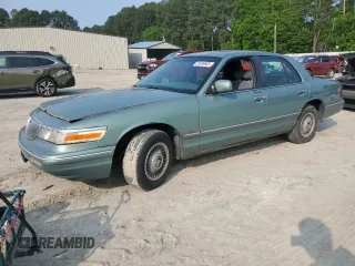 1997 Mercury Grand Marquis GS z VIN 2MELM74W2VX663313, wystawiony jako Copart lot #59539665 z przebiegiem 260 024 mil mil oraz Czysty tytuł • Clean title. Historia ofert i sprzedaży dostępna na DreamBid. Obrazek 1.