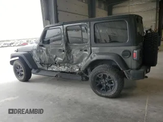 2020 Jeep Wrangler Unlimited Willys with VIN 1C4HJXDM2LW345683, listed as a Copart auction lot 57156215 with Not provided miles and Salvage title. Bid and sale history available at DreamBid. Image 2.