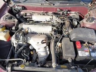 1996 Toyota Camry DX z VIN 4T1BG12K3TU662835, wystawiony jako IAAI lot #42060645 z przebiegiem 195 600 mil mil oraz . Historia ofert i sprzedaży dostępna na DreamBid. Obrazek 10.