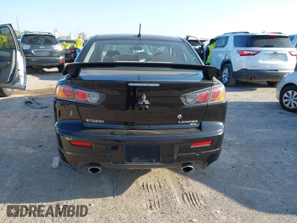 2014 Mitsubishi Lancer Ralliart with VIN JA32V6FVXEU005172, listed as a IAAI auction lot 41983895 with 70,584 mi miles and . Bid and sale history available at DreamBid. Image 16.