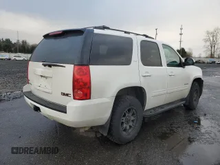 2012 GMC Yukon SLT with VIN 1GKS2DE00CR284687, listed as a Copart auction lot 46754465 with 123,346 mi miles and Salvage Title. Bid and sale history available at carsss.com. Image 3.