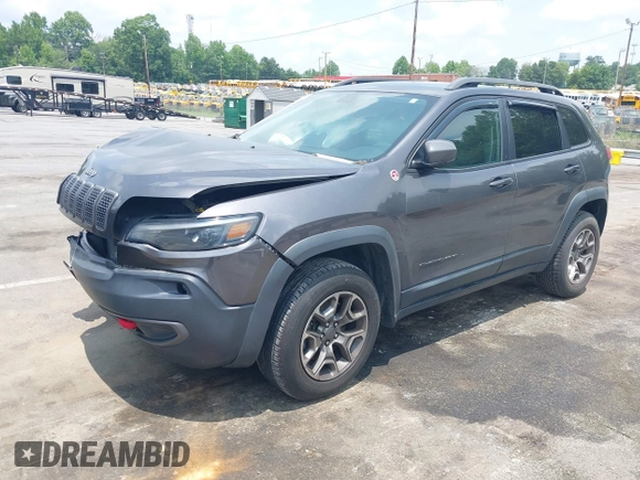 2020 Jeep Cherokee Trailhawk with VIN 1C4PJMBX5LD530720, listed as a IAAI auction lot 42404948 with 99,606 mi miles and . Bid and sale history available at DreamBid. Image 17.