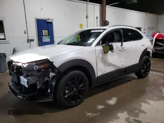 2023 Mazda CX-30 Premium Plus with VIN 3MVDMBEY3PM587798, listed as a Copart auction lot 86524444 with 9,860 mi miles and Salvage title. Bid and sale history available at DreamBid. Image 1.