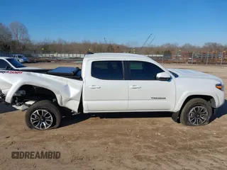 2021 Toyota Tacoma 4WD SR5 with VIN 3TYDZ5BN3MT001860, listed as a IAAI auction lot 41269423 with 23,378 mi miles. Bid and sale history available at carsss.com. Image 13.