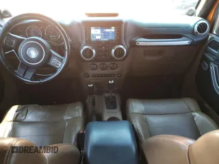 2011 Jeep Wrangler Unlimited Rubicon with VIN 1J4HA6H12BL584493, listed as a Copart auction lot 61765735 with 151,175 mi miles and Salvage title. Bid and sale history available at DreamBid. Image 8.