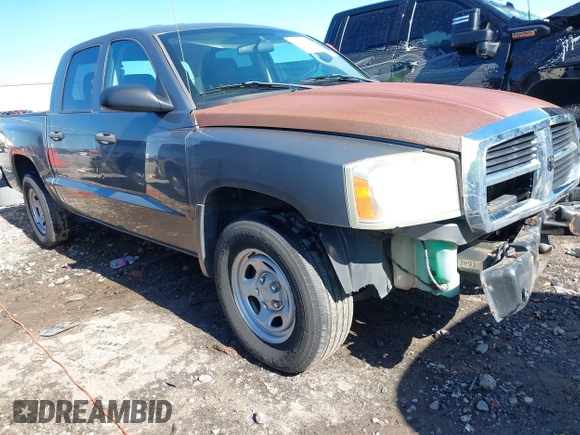 2006 Dodge Dakota ST z VIN 1D7HE28K76S560008, wystawiony jako IAAI lot #42176260 z przebiegiem 199 518 mil mil oraz . Historia ofert i sprzedaży dostępna na DreamBid. Obrazek 1.