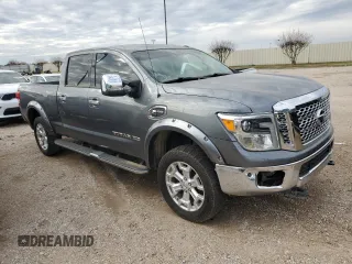2016 Nissan Titan XD PRO-4X with VIN 1N6BA1F4XGN517824, listed as a Copart auction lot 83119324 with 150,310 mi miles and Clean Title. Bid and sale history available at carsss.com. Image 4.