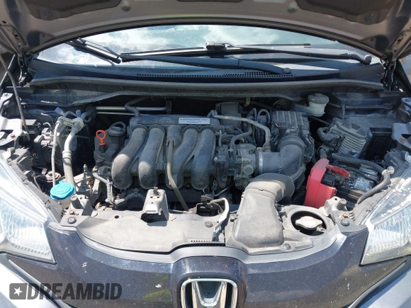 2015 Honda Fit LX with VIN 3HGGK5G57FM747786, listed as a IAAI auction lot 42656703 with 102,637 mi miles and . Bid and sale history available at DreamBid. Image 10.