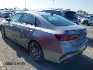 2024 Kia Forte GT z VIN 3KPF44AC7RE802984, wystawiony jako IAAI lot #42147389 z przebiegiem 7018 mil mil oraz . Historia ofert i sprzedaży dostępna na DreamBid. Obrazek 3.