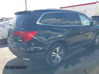 2016 Honda Pilot EX-L with VIN 5FNYF6H53GB048317, listed as a IAAI auction lot 41826297 with 127,672 mi miles. Bid and sale history available at carsss.com. Image 4.