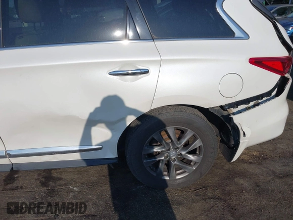 2015 Infiniti QX60 z VIN 5N1AL0MM8FC517929, wystawiony jako IAAI lot #42118295 z przebiegiem 104 188 mil mil oraz . Historia ofert i sprzedaży dostępna na DreamBid. Obrazek 17.