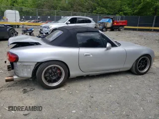 2004 Mazda MX-5 Miata LS with VIN JM1NB353640400140, listed as a Copart auction lot 56127165 with 123,276 mi miles and Salvage title. Bid and sale history available at DreamBid. Image 3.