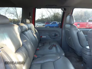 1999 GMC Yukon with VIN 1GKEK13R9XJ748190, listed as a IAAI auction lot 41317890 with 330,490 mi miles. Bid and sale history available at carsss.com. Image 8.