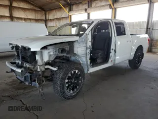 2017 Nissan Titan Platinum Reserve z VIN 1N6AA1E57HN515214, wystawiony jako Copart lot #57759485 z przebiegiem 94 784 mil mil oraz Szkoda całkowita • Salvage title. Historia ofert i sprzedaży dostępna na DreamBid. Obrazek 1.