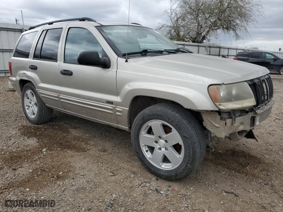 2004 Jeep Grand Cherokee Laredo with VIN 1J4GX48S14C231995, listed as a Copart auction lot 47069175 with 230,062 mi miles and Salvage Title. Bid and sale history available at carsss.com. Image 4.