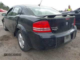 2010 Dodge Avenger R/T with VIN 1B3CC5FB1AN200983, listed as a IAAI auction lot 41959344 with 121,934 mi miles and . Bid and sale history available at DreamBid. Image 3.