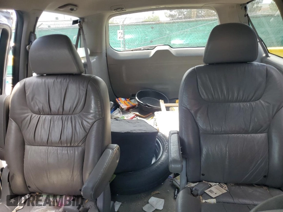 2009 Honda Odyssey LX z VIN 5FNRL38209B051664, wystawiony jako Copart lot #56710125 z przebiegiem 123 mil mil oraz Nie do naprawy • Non repairable. Historia ofert i sprzedaży dostępna na DreamBid. Obrazek 10.