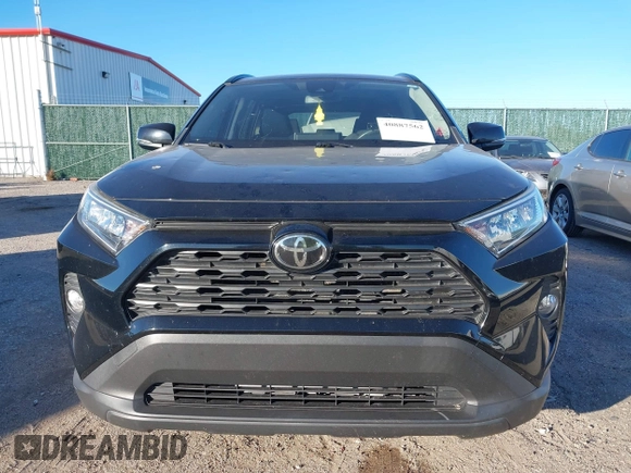 2019 Toyota RAV4 XLE with VIN JTMW1RFV1KD002799, listed as a IAAI auction lot 40887562 with 75,016 mi miles. Bid and sale history available at carsss.com. Image 12.