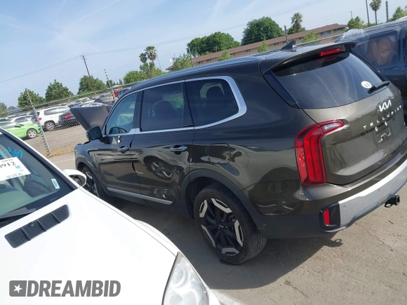 2023 Kia Telluride S with VIN 5XYP6DGC0PG334800, listed as a IAAI auction lot 42078611 with 27,486 mi miles and . Bid and sale history available at DreamBid. Image 14.