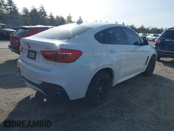 2015 BMW X6 xDrive35i with VIN 5UXKU2C50F0N77117, listed as a IAAI auction lot 41901159 with 104,820 mi miles. Bid and sale history available at carsss.com. Image 4.