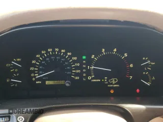 1999 Lexus LX 470 z VIN JT6HT00W1X0045075, wystawiony jako Copart lot #55684785 z przebiegiem 168 855 mil mil oraz Szkody całkowita. Historia ofert i sprzedaży dostępna na DreamBid. Obrazek 9.