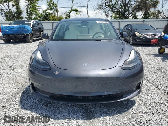2023 Tesla Model 3 z VIN 5YJ3E1EA0PF571943, wystawiony jako Copart lot #58338235 z przebiegiem 41 584 mil mil oraz Szkoda całkowita • Salvage title. Historia ofert i sprzedaży dostępna na DreamBid. Obrazek 5.