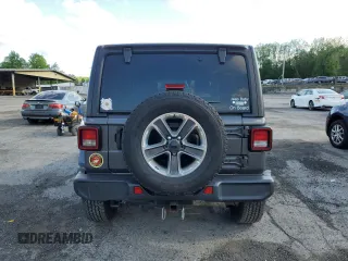 2022 Jeep Wrangler Unlimited Sahara z VIN 1C4HJXEN0NW110192, wystawiony jako Copart lot #57206625 z przebiegiem 32 964 mil mil oraz Szkoda całkowita • Salvage title. Historia ofert i sprzedaży dostępna na DreamBid. Obrazek 6.