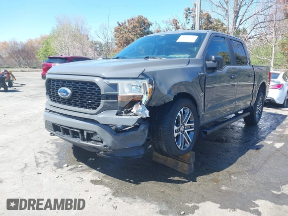 2021 Ford F-150 XL with VIN 1FTEW1EP0MFA56166, listed as a IAAI auction lot 41858793 with 48,498 mi miles and . Bid and sale history available at DreamBid. Image 2.