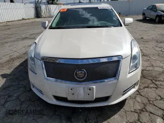 2014 Cadillac XTS Premium with VIN 2G61P5S36E9305491, listed as a Copart auction lot 44404425 with 104,710 mi miles and Salvage Title. Bid and sale history available at DreamBid. Image 5.
