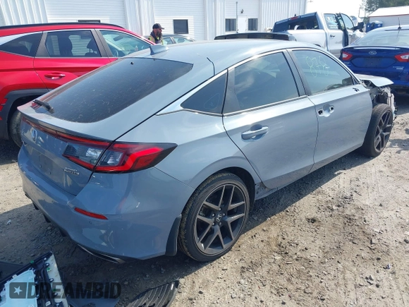 2022 Honda Civic Sport Touring z VIN 19XFL1H82NE003000, wystawiony jako IAAI lot #42020685 z przebiegiem 46 740 mil mil oraz . Historia ofert i sprzedaży dostępna na DreamBid. Obrazek 4.